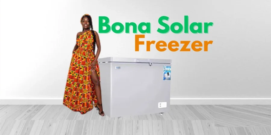 Bona solar freezer connected to solar panels, placed outside a rural shop in Nigeria.