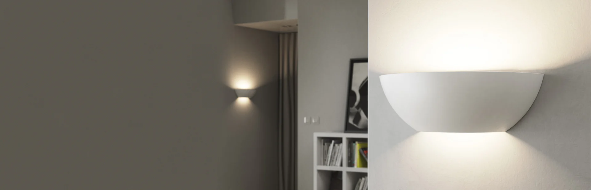 Contemporary half moon wall bracket light in a hallway