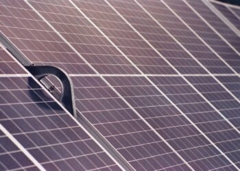 Close-up of solar panel modules showing rows of photovoltaic cells, shot on film