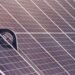 Close-up of solar panel modules showing rows of photovoltaic cells, shot on film