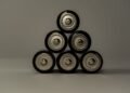 Cylindrical batteries arranged in a triangle shape on a flat surface