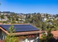 Suburban house with solar panels installed on its roof