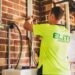 Electrician installing a home solar battery storage system on a wall